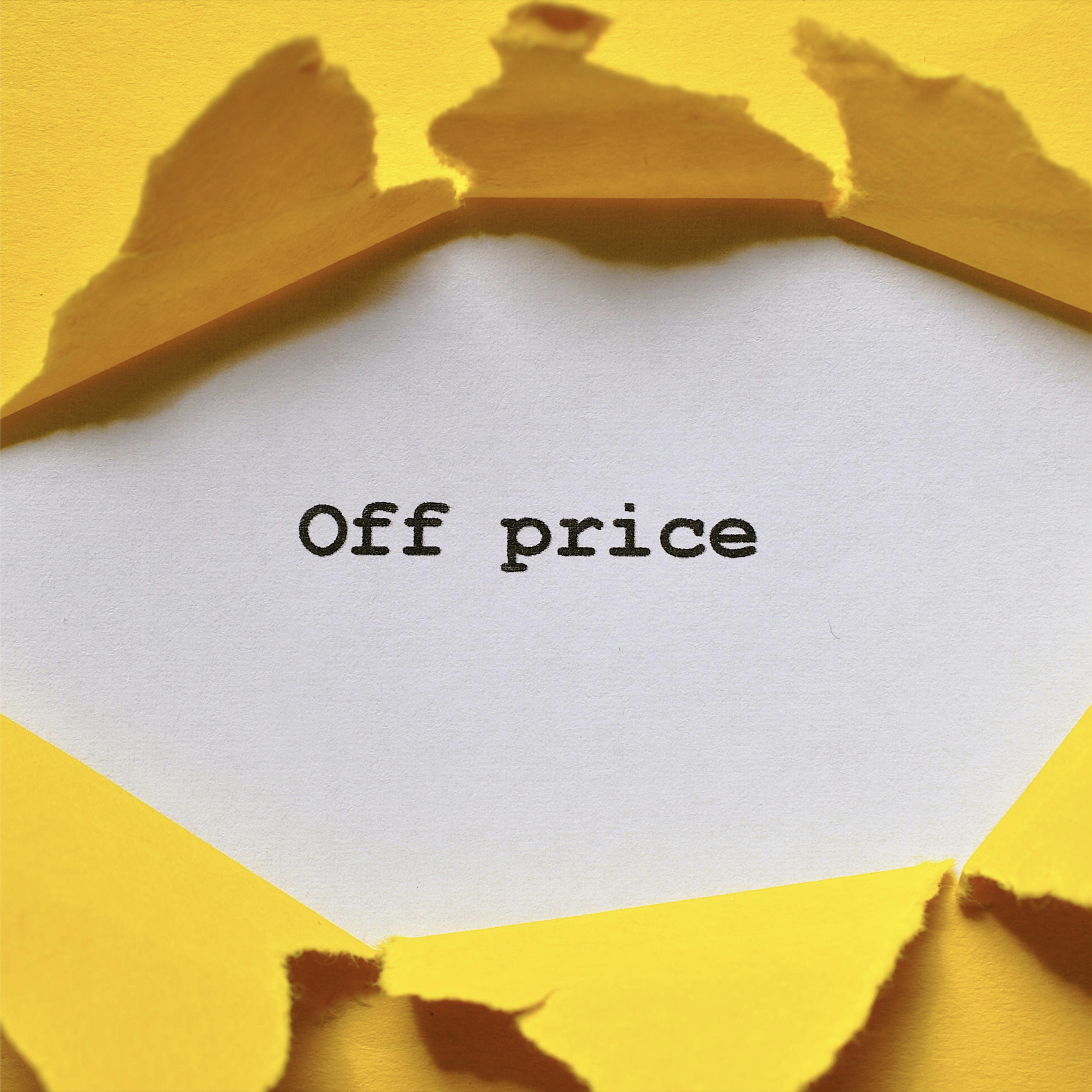 Torn yellow paper revealing the words "Off price" typed on white, representing influencer marketing pricing and cost transparency